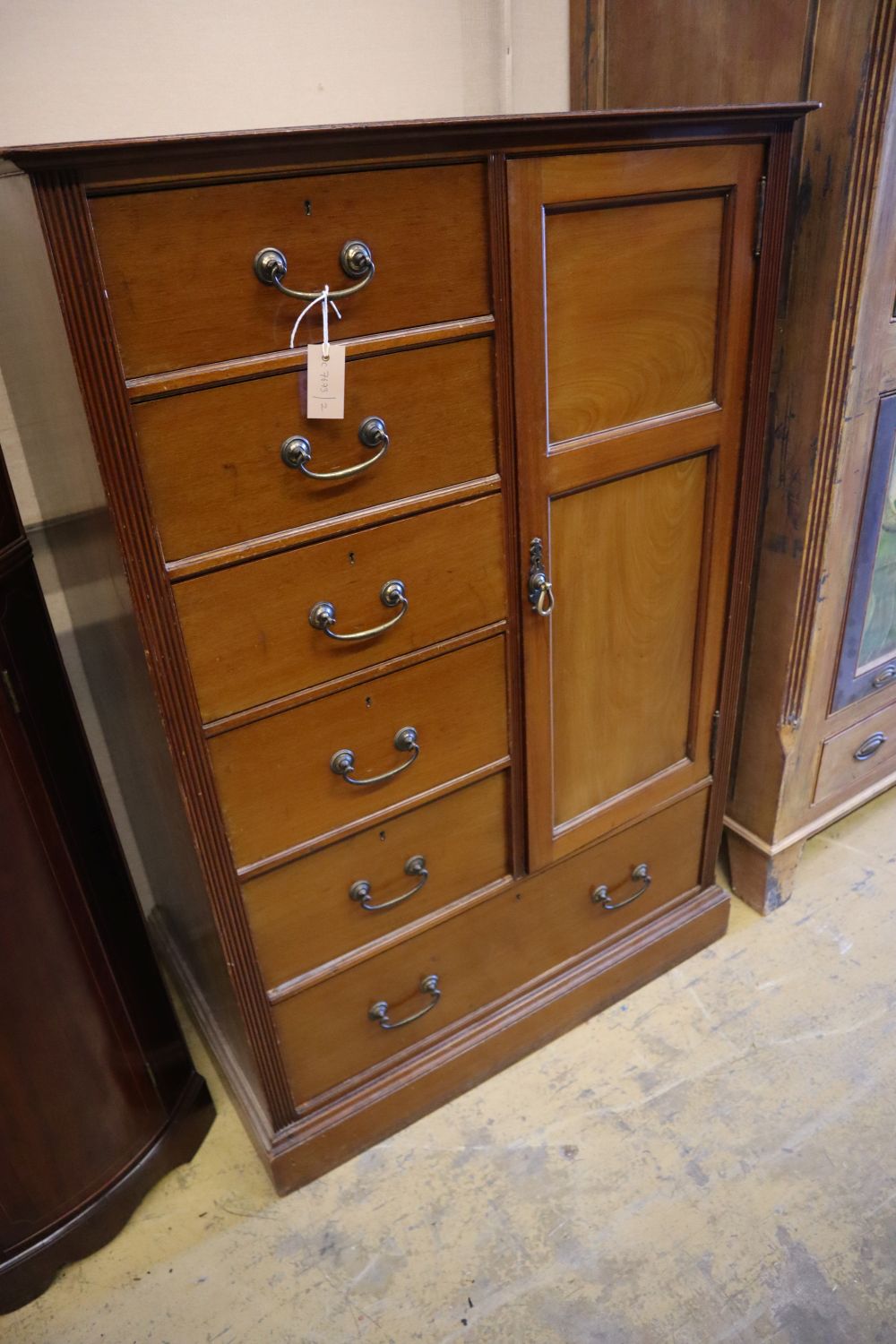 An Edwardian Maple & Co. compactum wardrobe, width 93cm